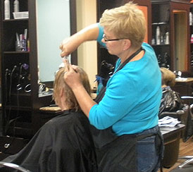 Stylist Cutting Hair